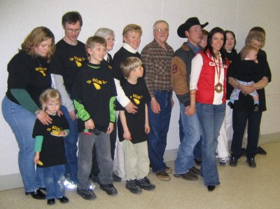Part of Mellisa's extended family that were present at the special evening in Eckville honouring her World Cup season victory and Olympic bronze medal. Mellisa is wearing her Olympic bronze medal. On Mellisa's left is her husband Billy Richards, next to him is Mellisa's uncle Arnold Mottus, keeper of the Mottus clan family history and family tree. The young man with glasses at the left side is Ryan Davenport, Mellisa's cousin and seven-time Canadian skeleton champion and manufacturer of skeleton sleds. Photo: Peeter Leesment     - pics/2006/12909_1.jpg