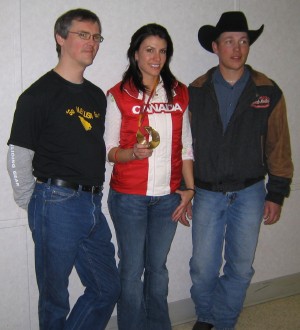 Eckville, Alberta honoured Mellissa Hollingsworth-Richards on March 17th for achieving an Olympic medal and World Cup season over-all win. Ryan Davenport, Mellisa Hollingsworth-Richards with her Olympic bronze medal and her husband Billy Richards. Photo: Helgi Leesment  - pics/2006/12909_2.jpg