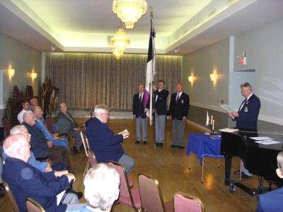 Chairman Heikki Paara (right) addressing the TEM anniversary rehearsal. In<br> the TEM flag colour guard are (from left) Alver Rõika, Toomas Trei and Paul Kiilaspea.<br> Photo: Arved Plaks - pics/2006/14392_1_t.jpg