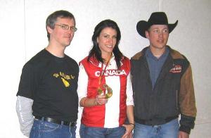 Eckville, Alberta honoured Mellissa Hollingsworth on March 17th 2006  for achieving an Olympic medal and World Cup season over-all win. From left Ryan Davenport, Mellisa Hollingsworth with her Olympic bronze medal and  Billy Richards. Photo: Helgi Leesment - pics/2009/11/26051_1_t.jpg