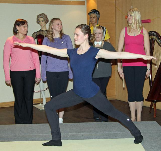 Filiae demonstrating Estonian yoga moves at Küünalpäev - Anneli Tamm (front), Leena Liivet, Silvi Kuld, Kristi Sau-Doughty, Elli Kipper and in the back superathletic manequins Anu and Peeter. - pics/2015/03/44526_001.jpg