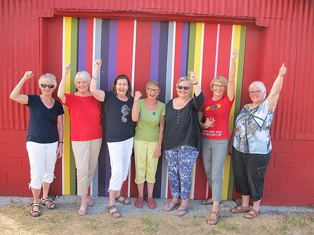 Members of the Estonian Ethnographic Society in Canada, from left Rutt Veskimets, Mall Puhm, Helle Arro, Ellen Leivat, Kati Marley, Maaja Matsoo and Liis Teedla, are proud as punch of their colourful, striped contribution to the blocks of the Prince Edward County Barn Quilt Trails. Photo: Maaja Matsoo - pics/2016/07/48042_001.jpg