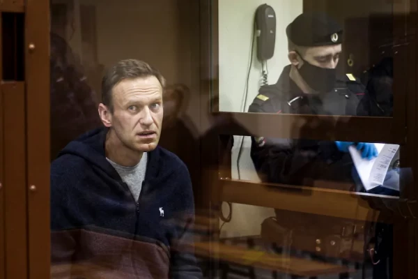 Russian opposition leader Alexei Navalny sits in a cage during a hearing Feb. 12 on his charges of defamation in the Babuskinsky District Court in Moscow. (Babuskinsky District Court Press Service via AP) (AP) - pics/2021/07/58474_001_t.webp